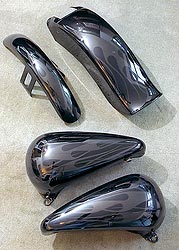 gunmetal flames on black motorcycle parts