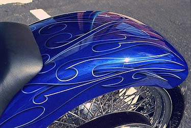 tribal flames with beveled edges on motorcycle rear fender