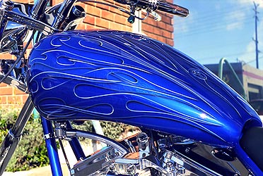 tribal flames with beveled edges on motorcycle tank