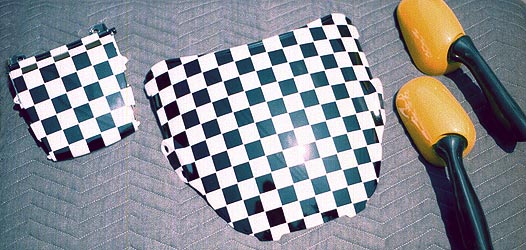 checkered graphics on motorcycle parts