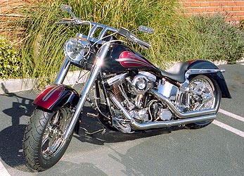 red and silver graphics on black Harley motorcycle