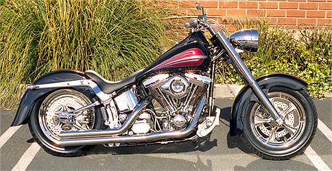 red and silver graphics on black Harley Davidson motorcycle