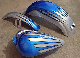 candy blue scallops on silver Harley Davidson motorcycle parts